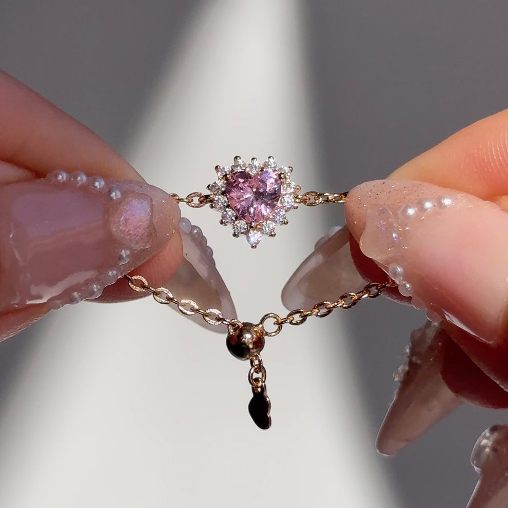 Bague chaîne à grappes de cœurs roses