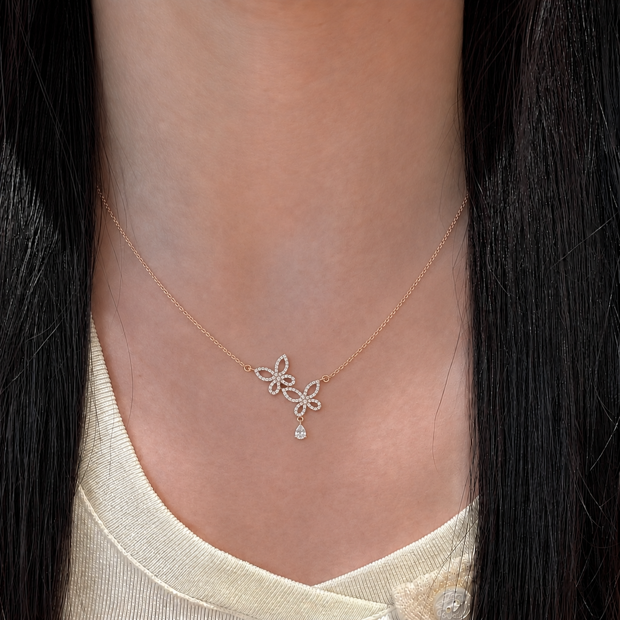Collier double papillon en forme de poire