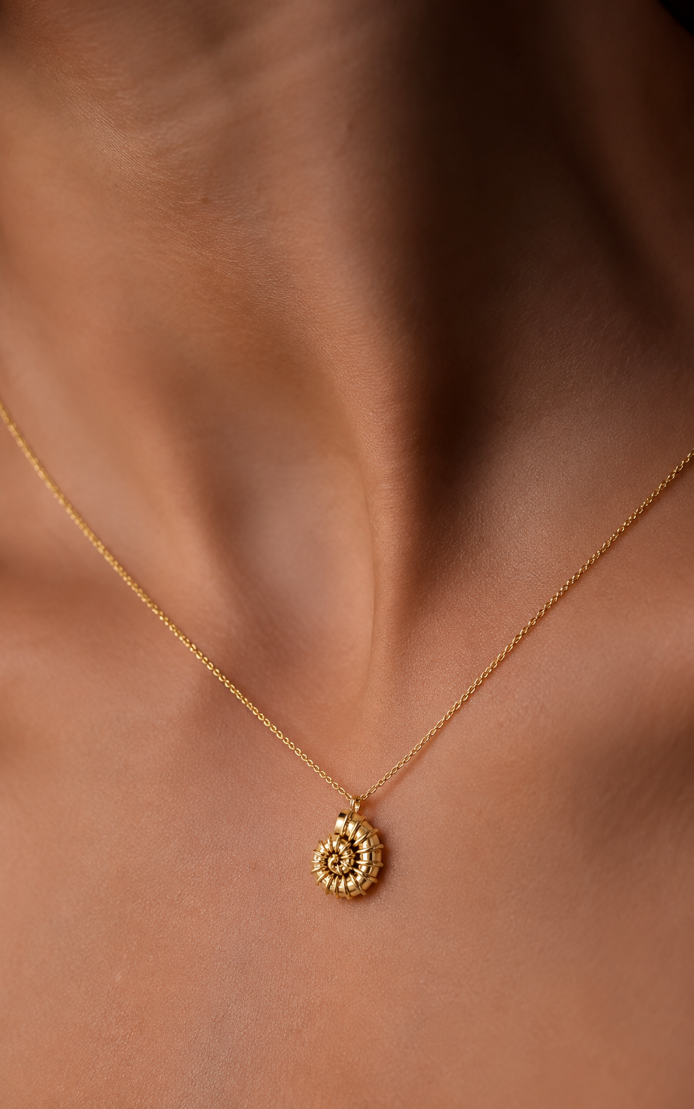 Pendentif coquillage en spirale
