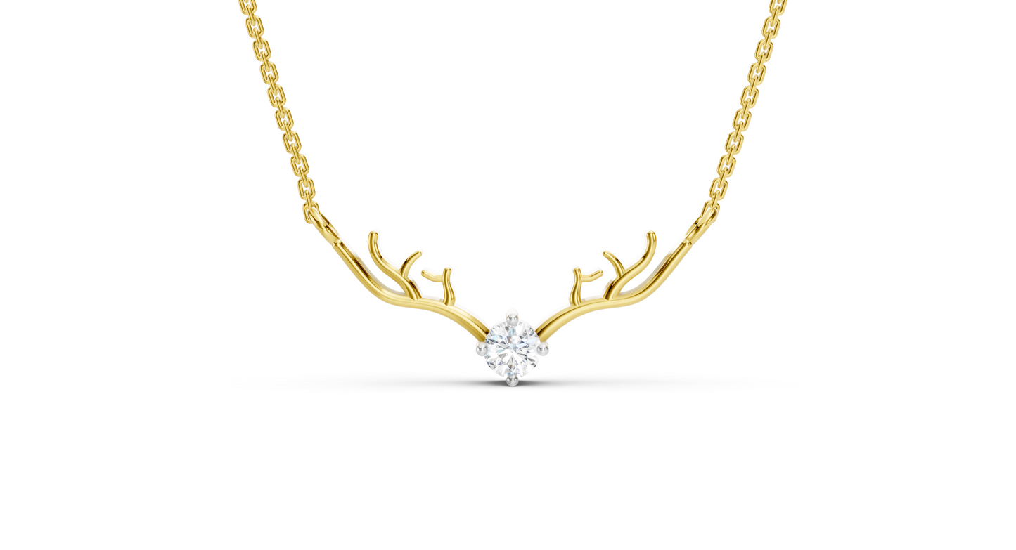Gold necklace with antler design and diamond on a white background