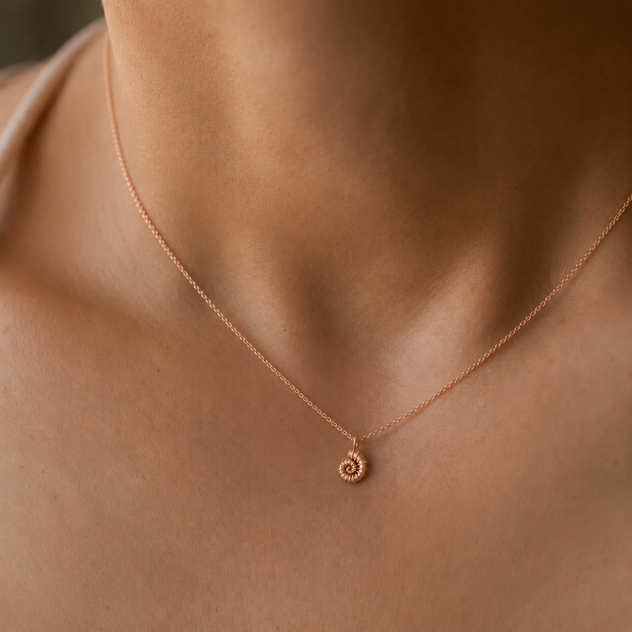 Pendentif coquillage en spirale
