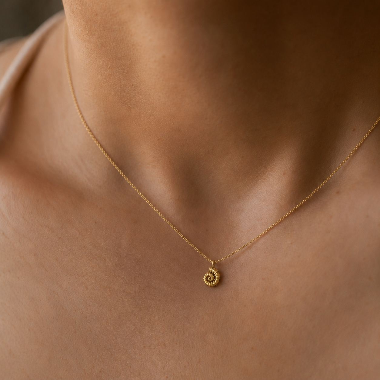 Pendentif coquillage en spirale